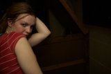 Red Haired Lady with Finger on her Cheek
