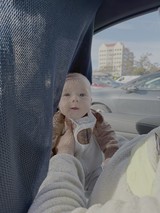 Baby's First Car Ride in Sunlight