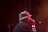 Hat-wearing Singer Serenades Crowd