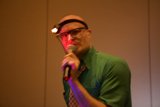 The Entertainer with a Hat and Microphone