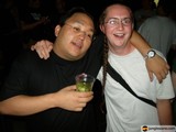 Party Snapshot: Two Men Cheersing
