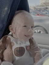 Baby's First Car Ride in Sunlight