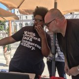 Questlove rocks the mic under his umbrella