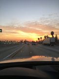 Driving towards the Sunset on the Freeway