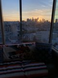 Cityscape View from My Cozy Living Room Window
