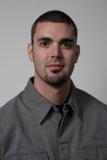 Portrait of Dan B in Gray Shirt and Jacket