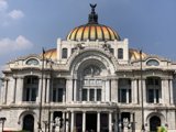 Gold Dome Building with Statue