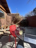 Outdoor Workstation with Laptop on a Patio Table