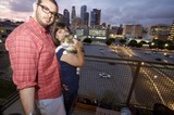 Couple with Cat on Downtown Los Angeles Rooftop Balcony