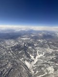 Soaring Over Majestic Peaks