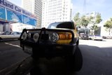 Sunny Yellow Truck in the City