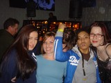 Four Friends Celebrating at a Nightclub in 2004