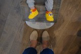 Parent and Child in Yellow Duck Slippers