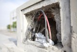 Wired Into the Concrete Wall