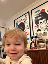 Joyful Toddler's Selfie in Vintage Comic-Themed Room