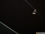 A Tennis Racket Hangs Loose