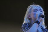 Blond Entertainer Rocks Coachella Stage