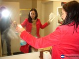 Red Coat Woman in a Dressing Room