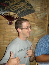 Two Men Giving a Thumbs Up