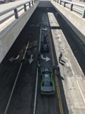 Parked Green Car Under LA Bridge