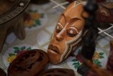 The Emblematic Wooden Mask