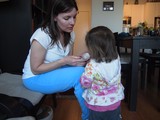 Mother Shares a Moment with Toddler at Home