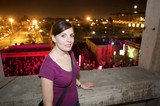 Woman Overlooking Electric Daisy Carnival at Night