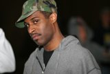 Marcus R in Grey Hoodie with Baseball Cap