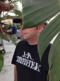 Randy J in Black Shirt and Hat