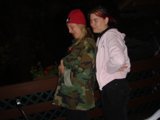 Standing by the Fence in Military Uniforms