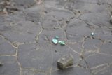 Blue Gemstone on Flagstone Walkway