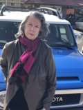 Blue Toyota Truck and Its Owner