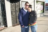Couple in Casual Garb at the Door