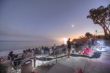 Sunset Gathering by the Ocean
