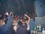 Nightclub Party with Upraised Hands