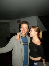 A Casual Portrait of Andrew T and a Woman in a Cozy Room