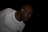 Portrait of a Happy Bald Man in White Undershirt