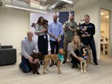 Paws and People: A Group Portrait with Furry Friends