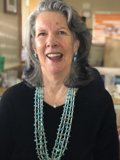 The Radiant Rhoda and Her Ornate Bead Necklace