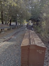 Model Railroad Enthusiast Working on Train Display