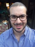 Portrait of a Happy Man with Glasses