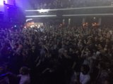 Rocking out at a Nightclub Concert