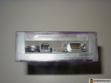 Vintage Cassette Player with Electrical Device in a Purple Box