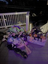Halloween Decorations Scattered on Deck at Night