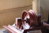 Wooden Wheel with Red Handle