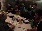 Friends Gathering in a Cozy Kitchen