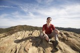 Summit Serenity: Hiker Resting on Eagle Rock Peak