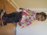Little Girl on Wooden Floor