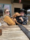 Table for Two: A Woman and Her Canine Companion