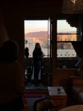 Woman gazing out the sunset